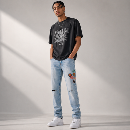 Amiri Light Indigo Distressed Patch Jeans - Luxury Slim Fit Designer Denim