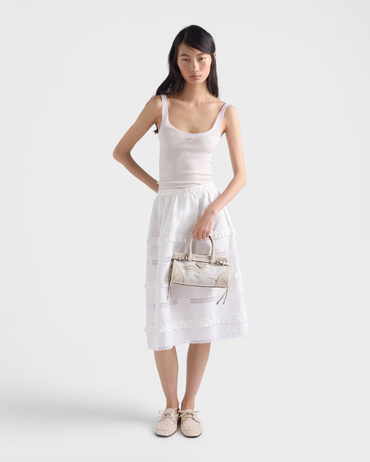 Prada Bonnie small printed linen and leather handbag