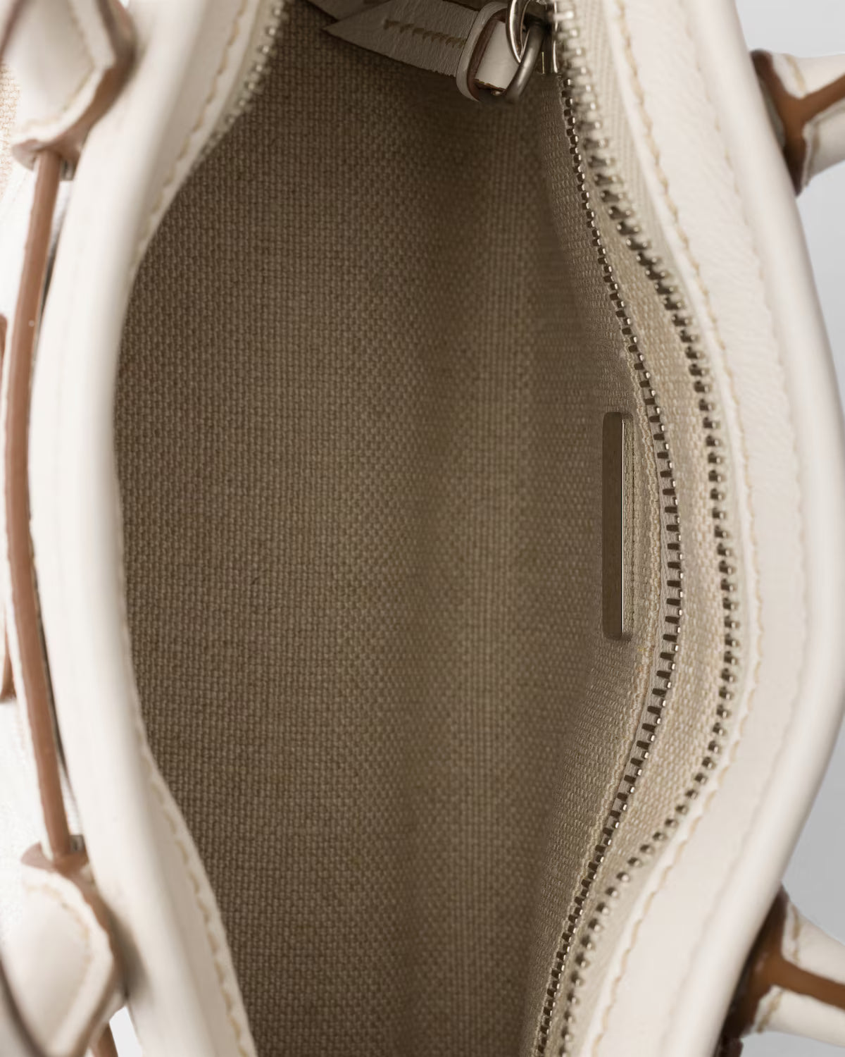 Prada Bonnie small printed linen and leather handbag